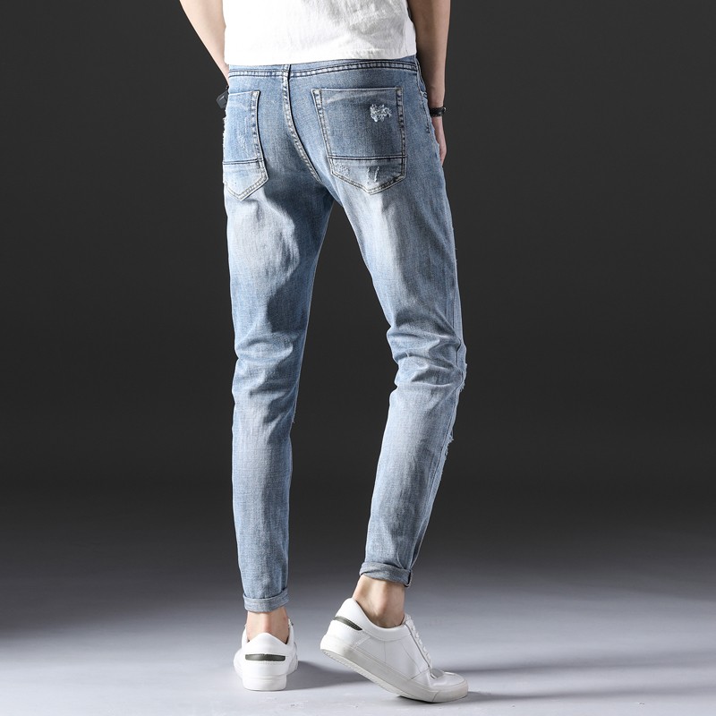 Fashionable ice blue mens ripped skinny jeans